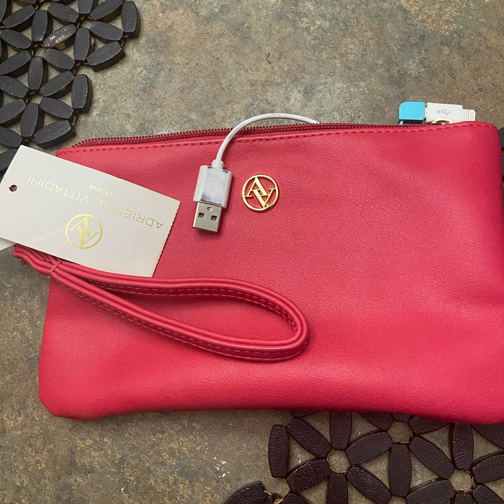 Charging wristlet wallet. Brand new